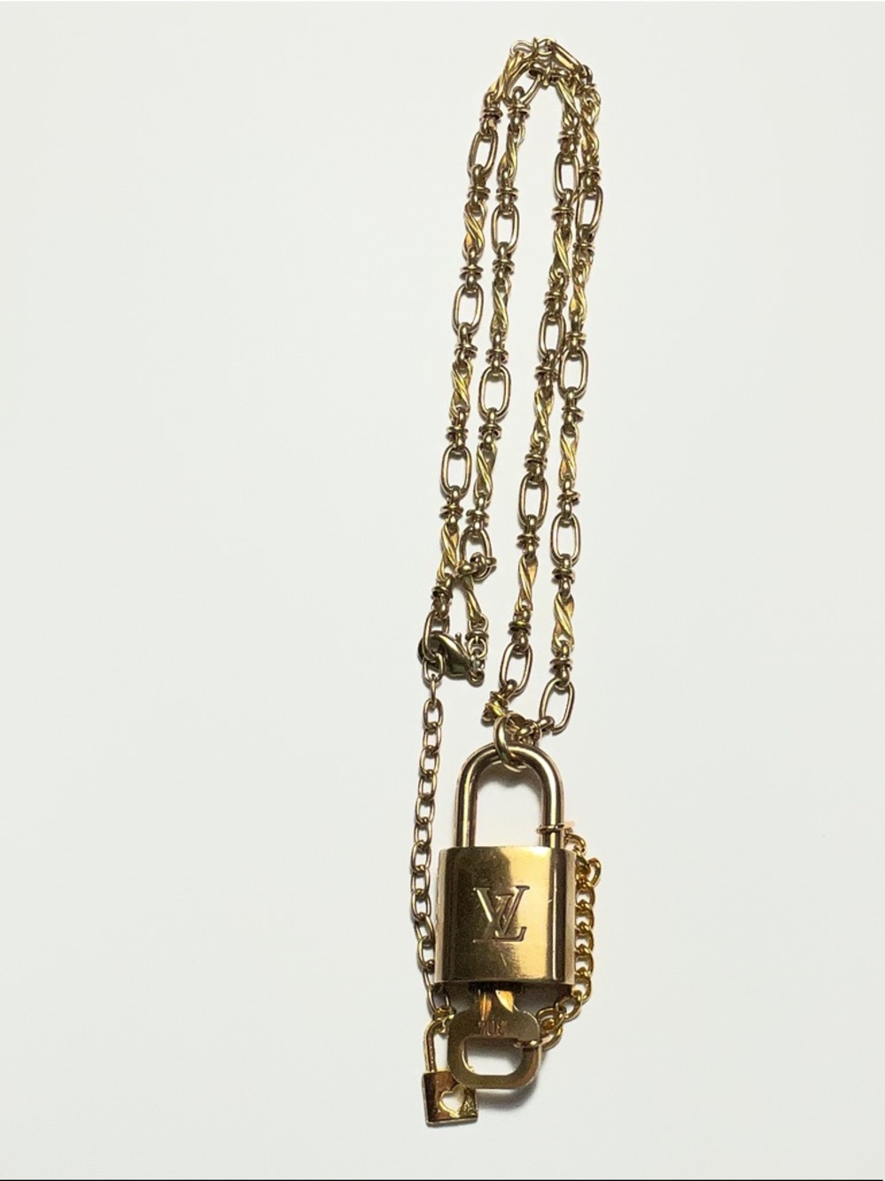 Authentic Louis Vuitton Brass Padlock and Key #304 put on a chain